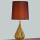 Lampe à poser aux feuillages de fougères dorés