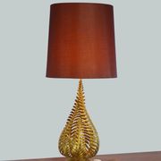 Lamp to lay on the foliage of golden ferns