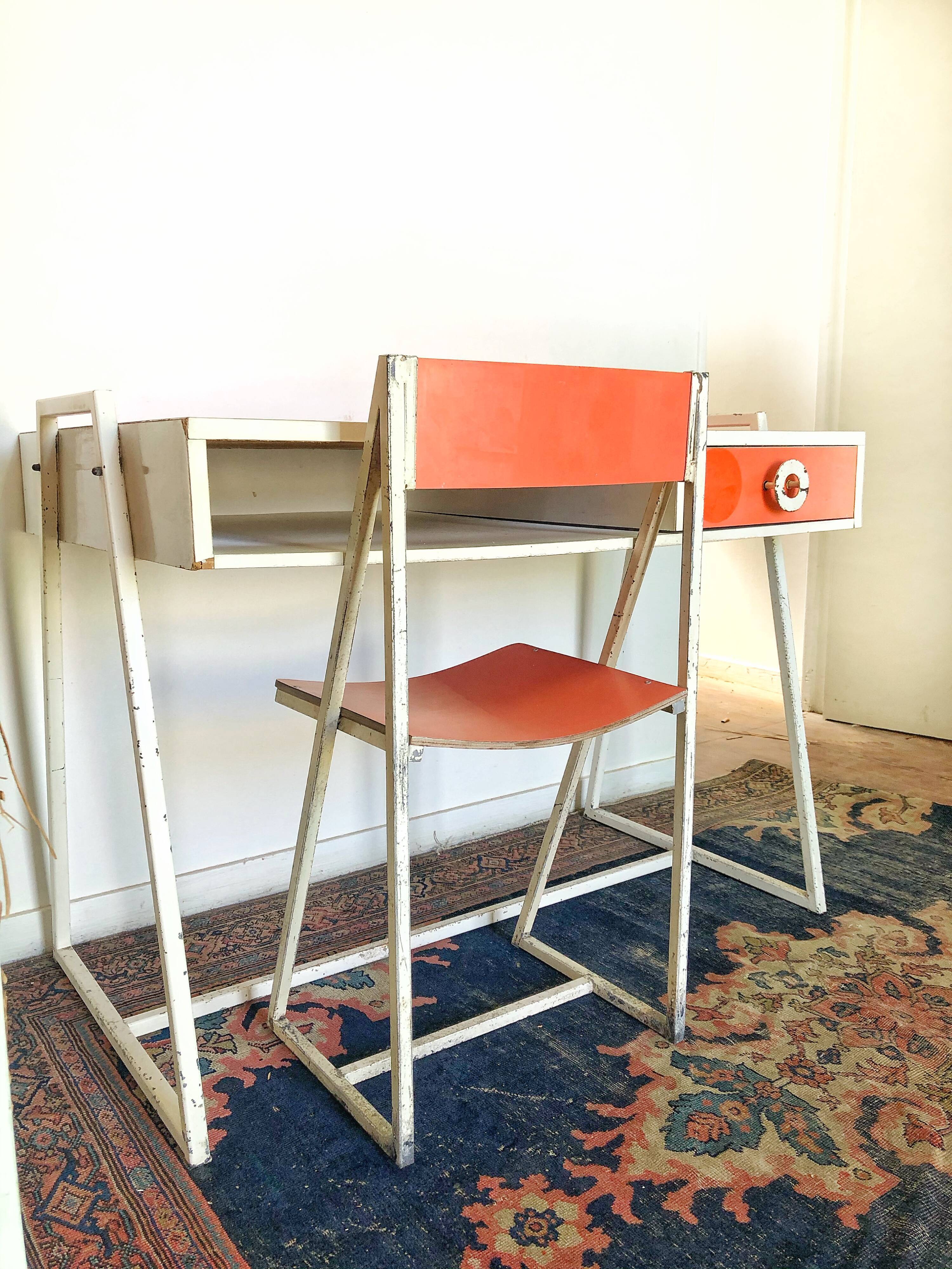 Vintage desk and chair in orange formica