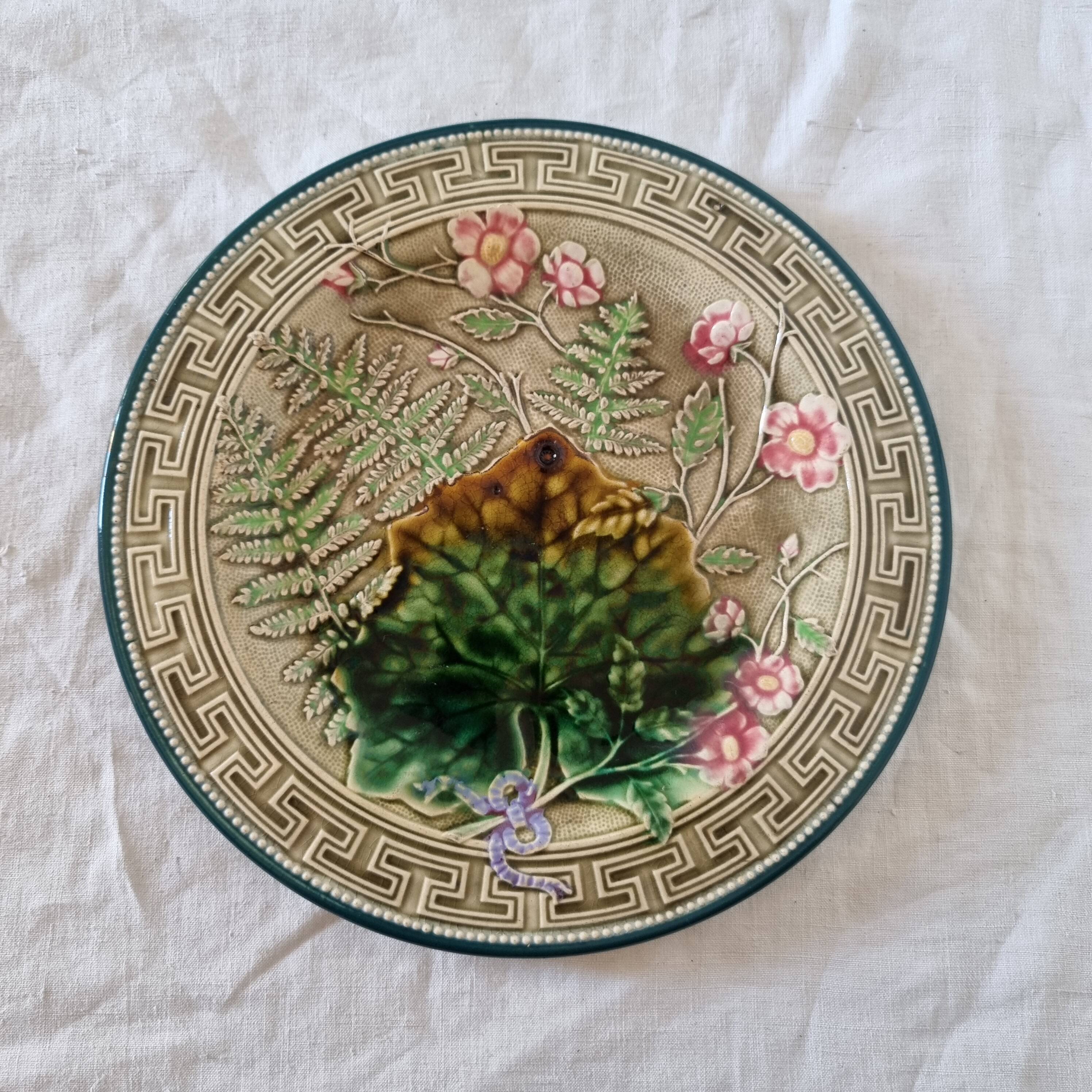 Choisy Le Roi majolica or barbotine dish decorated with leaves and pink flowers from the 19th century
