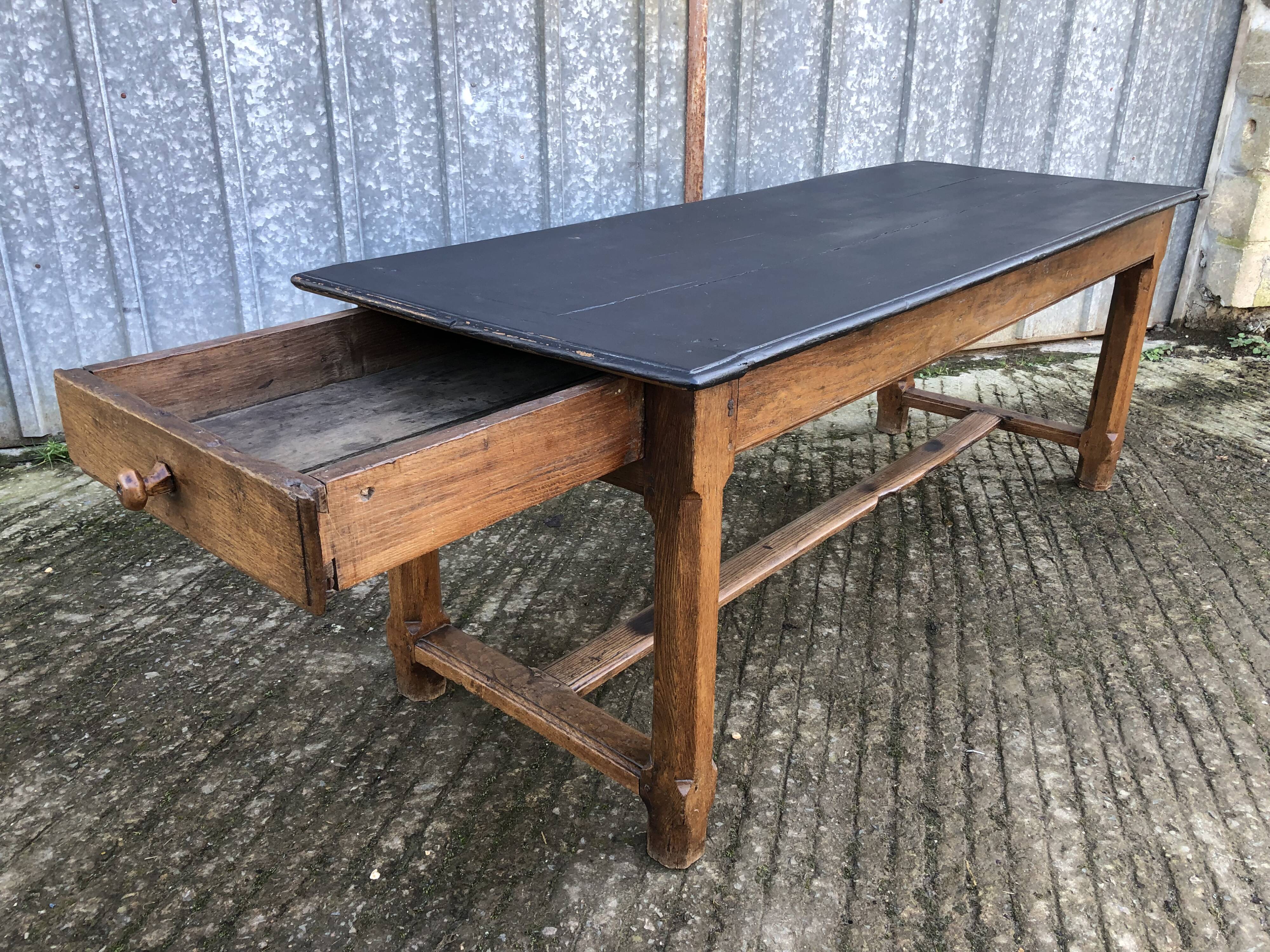 Antique oak farmhouse table with cat bar and 2 end drawers