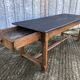 Antique oak farmhouse table with cat bar and 2 end drawers
