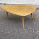 Scandinavian coffee table in the shape of a pebble/bean made of light solid wood from the years.