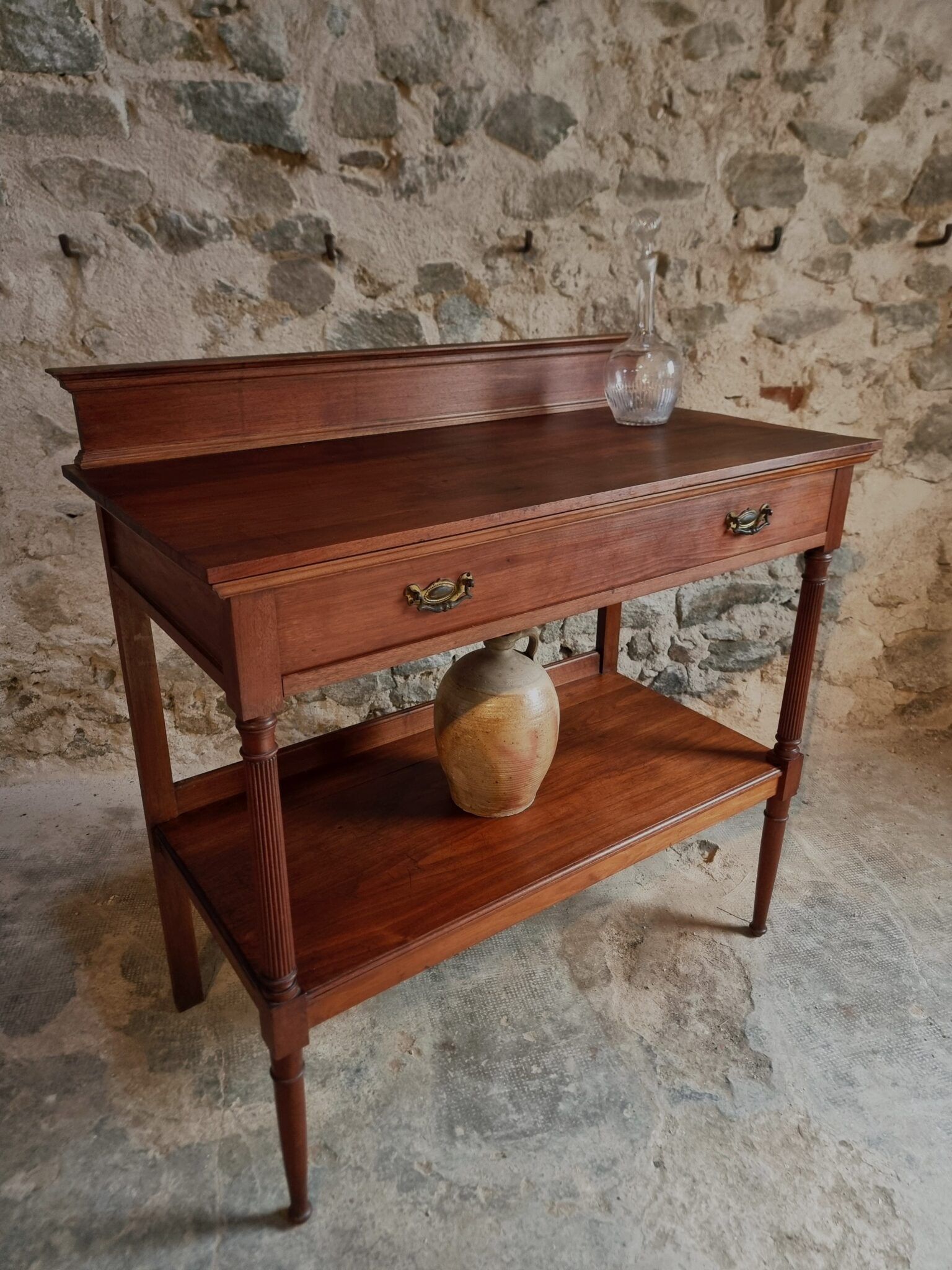 Antique mahogany console with drawer and shelf, French serving table, circa 1900.
