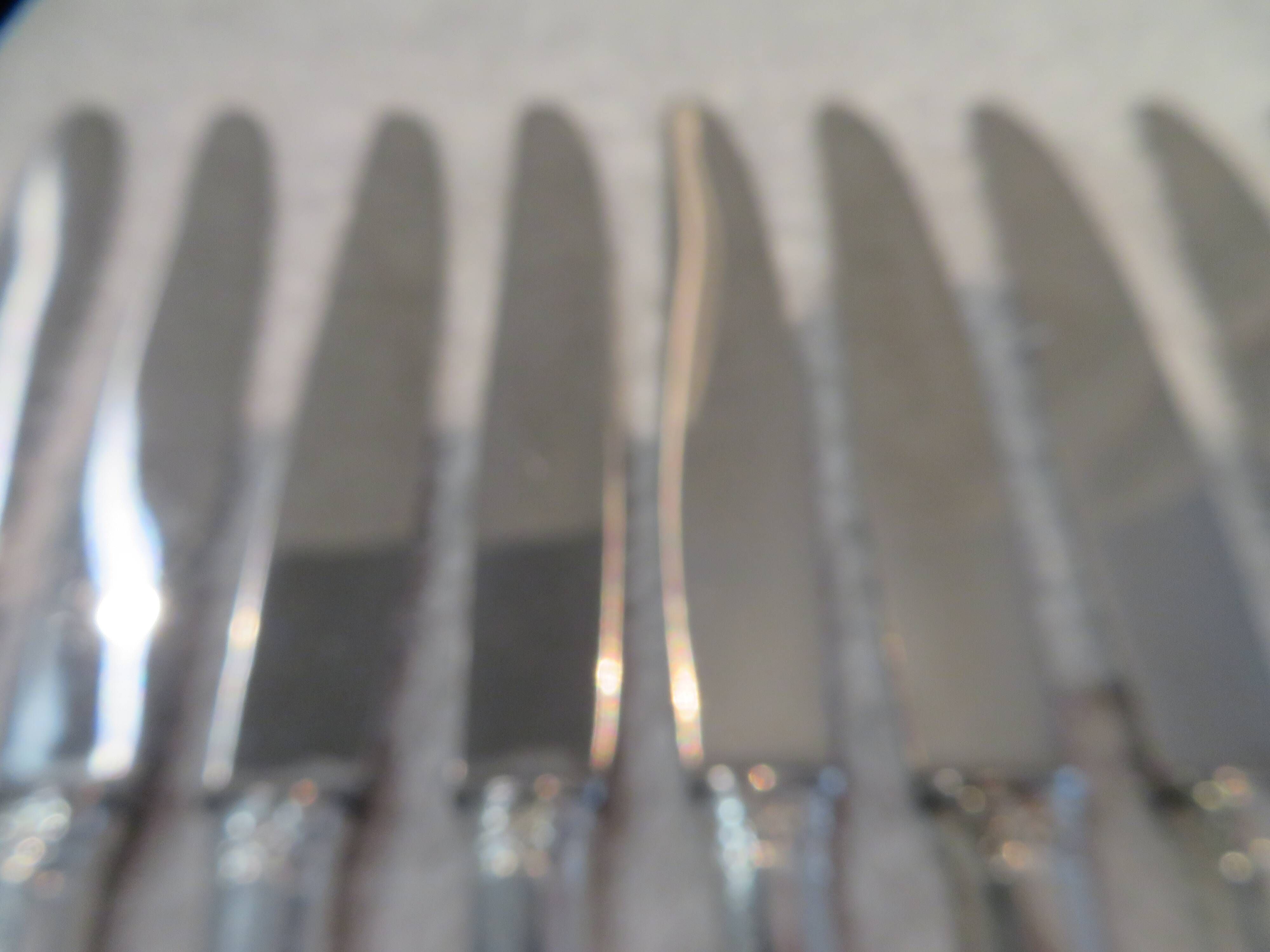 12 silver-plated dessert knives by Argit goldsmith? Art Deco floral bands