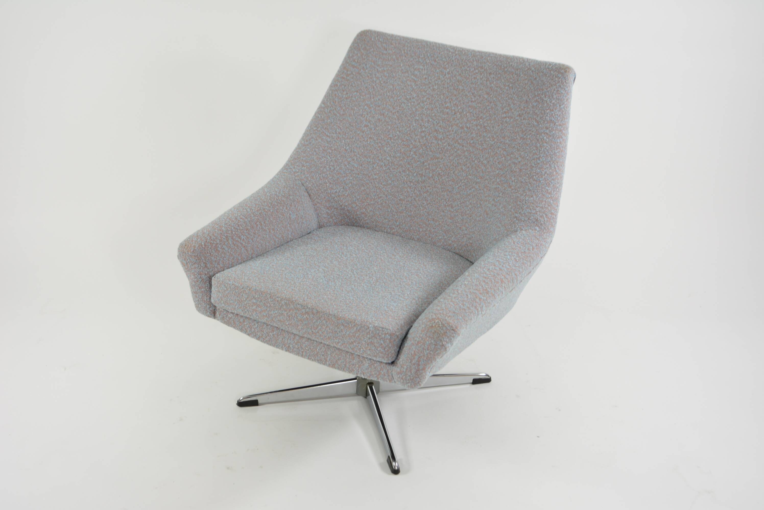 Modernist shell armchairs from the 1970s.