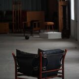 "Lounge chair 'Ilona' by Arne Norell in stained beech and leather, mid-20th century."