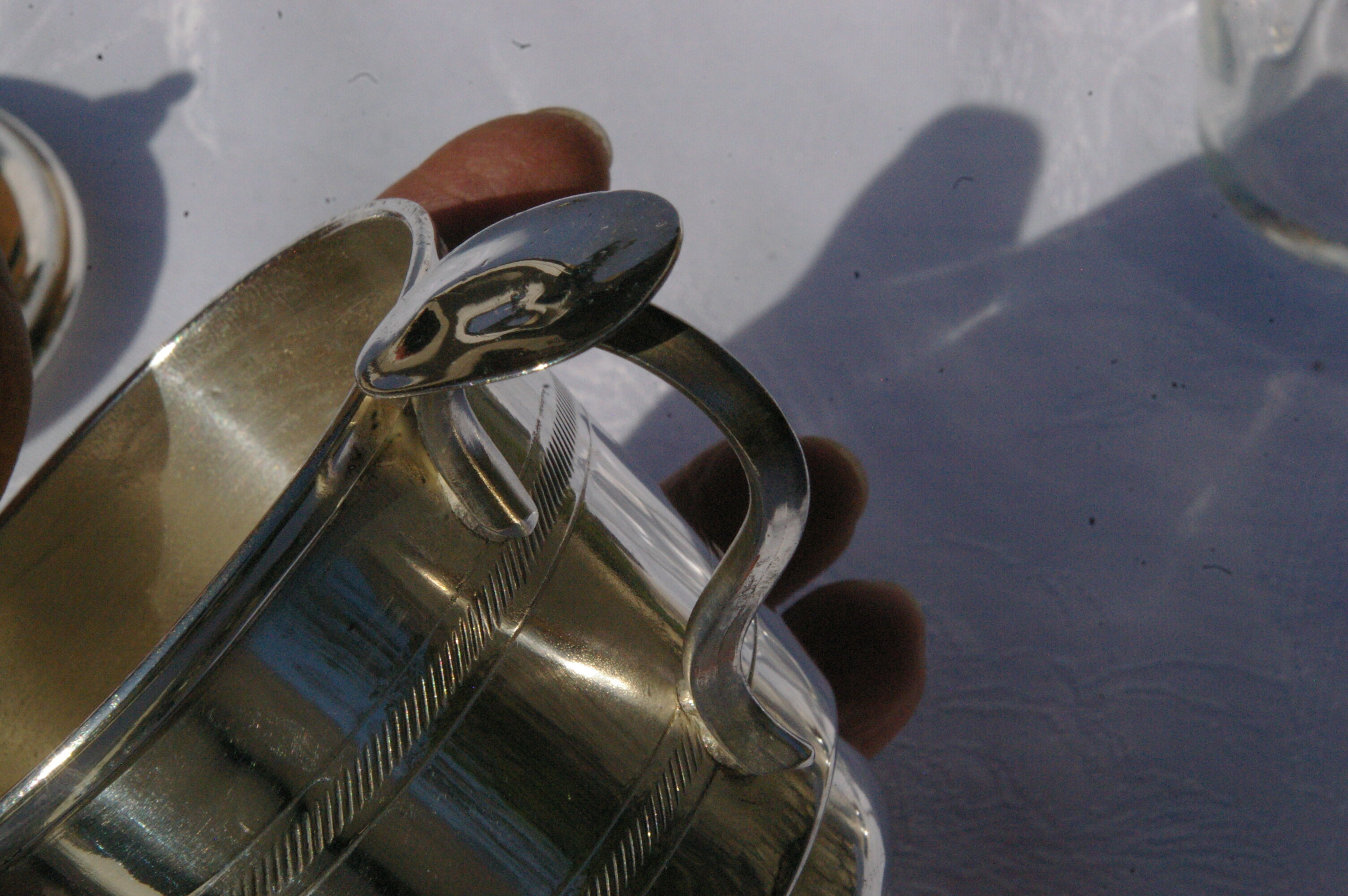 Tisher cup in silver metal and glass