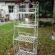 White wrought iron folding shelf