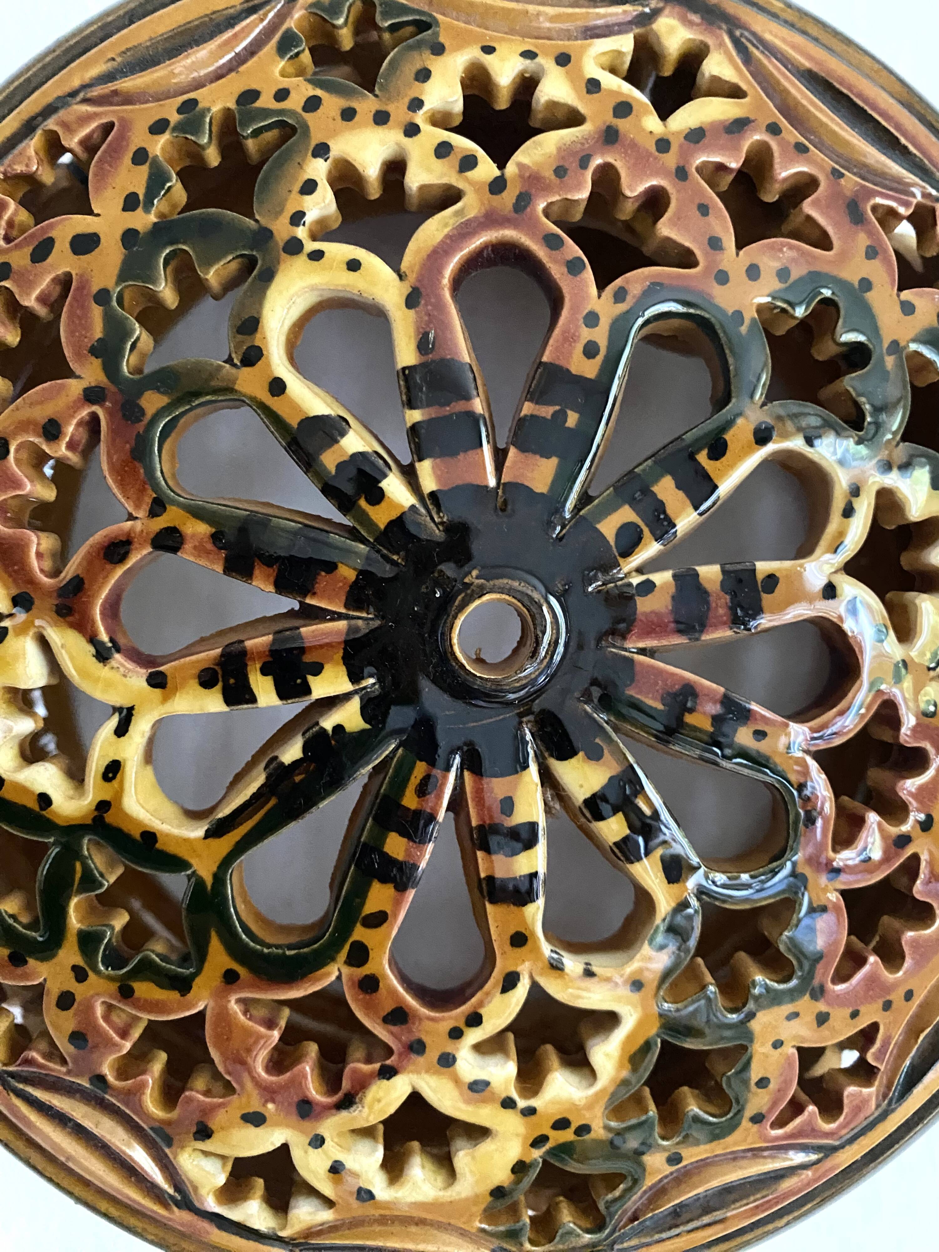 Pair of enamelled terracotta wall lights