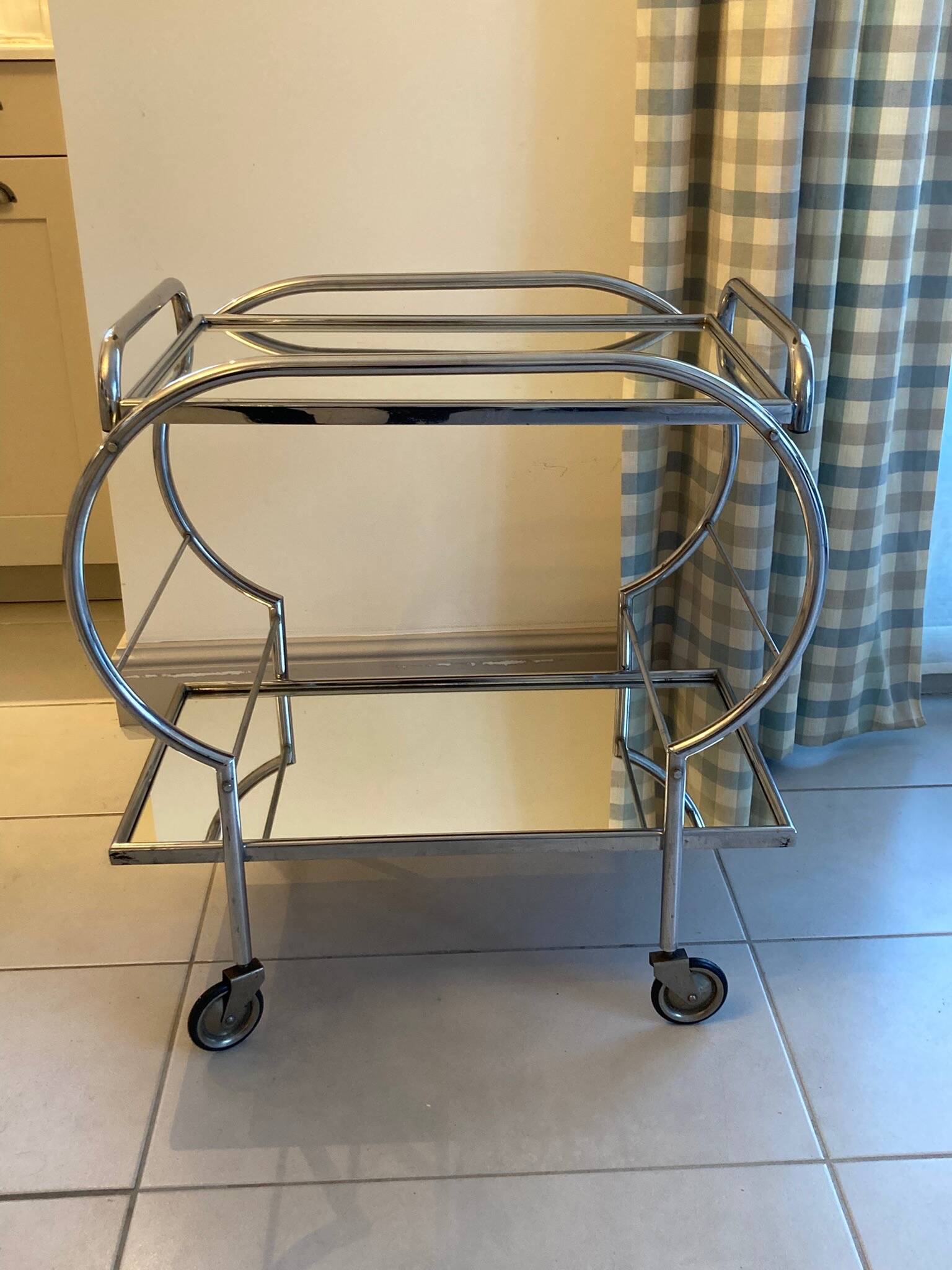 Chromed metal and mirror serving trolley