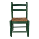 Vintage children's chair in green wood with a woven straw seat