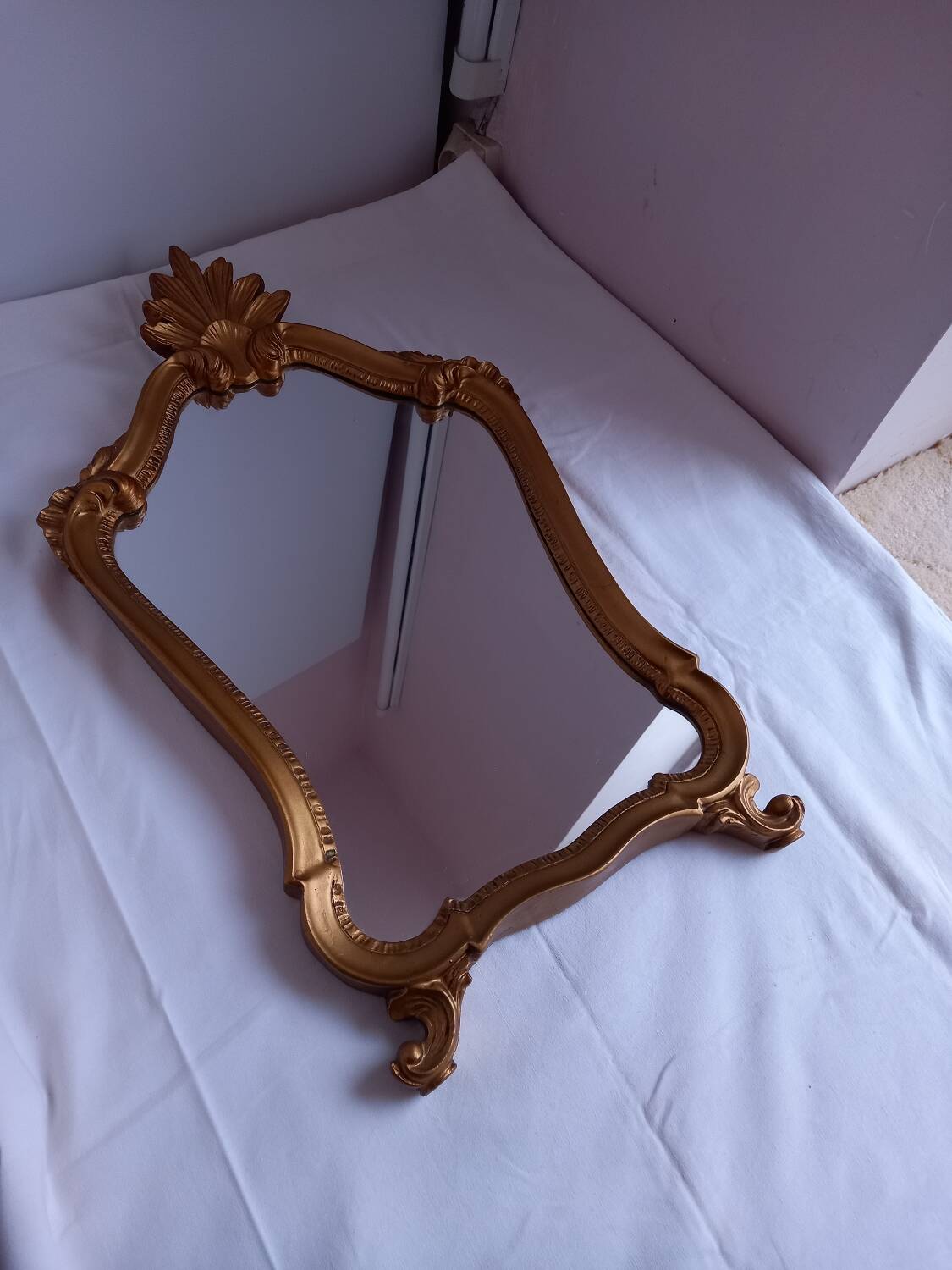 Antique gilded wooden mirror