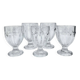 Set of 5 stemmed glasses made of pressed moulded glass.