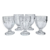Set of 5 stemmed glasses made of pressed moulded glass.