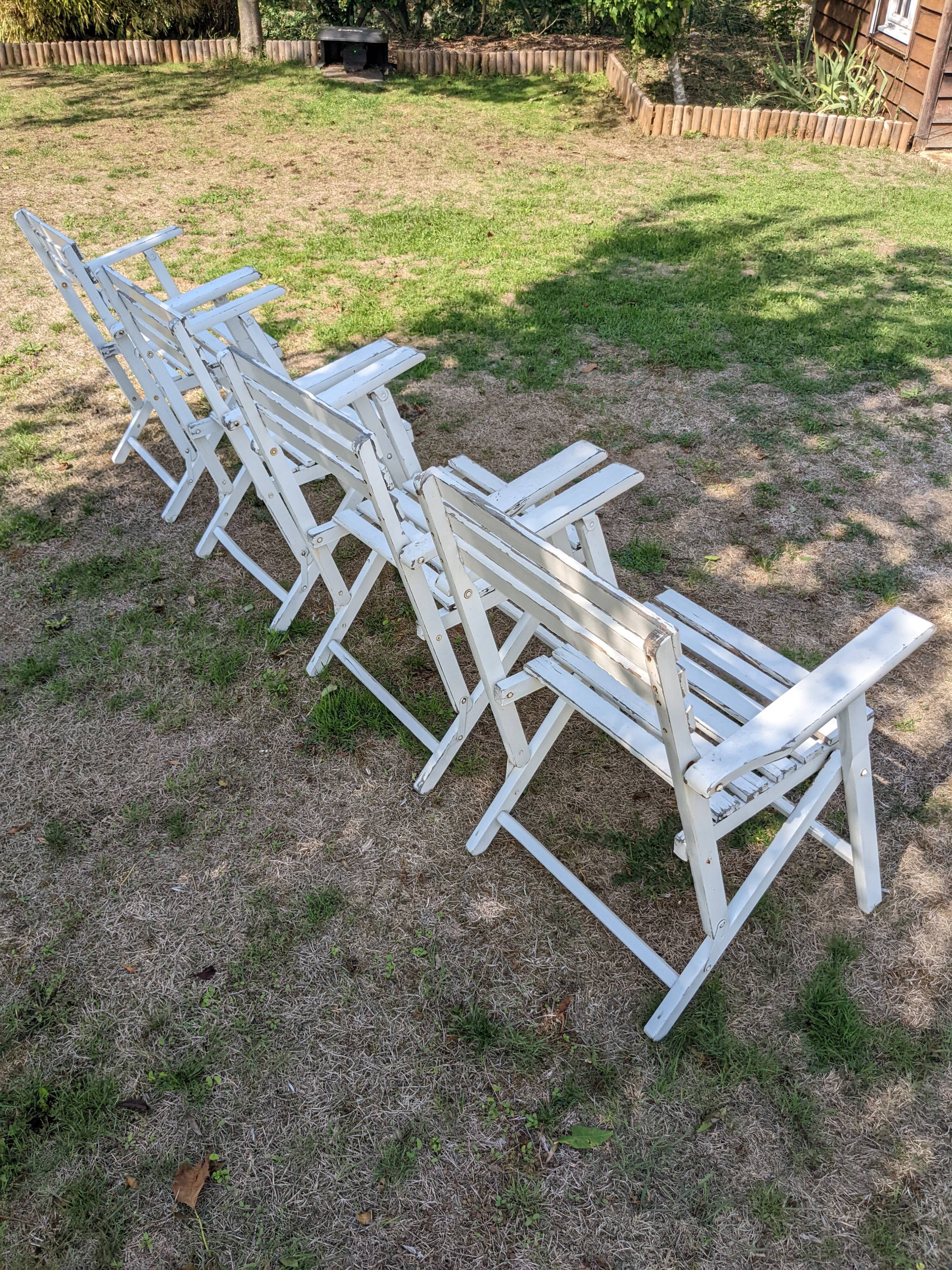 Set of 4 folding wooden garden chairs