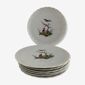 8 assiettes à dessert Bernardaud et Cie signées Elbé, porcelaine de Limoges, à décor d'oiseaux