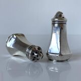 Antique salt and pepper shakers in solid English silver