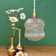 Suspension globe vintage en verre moulé