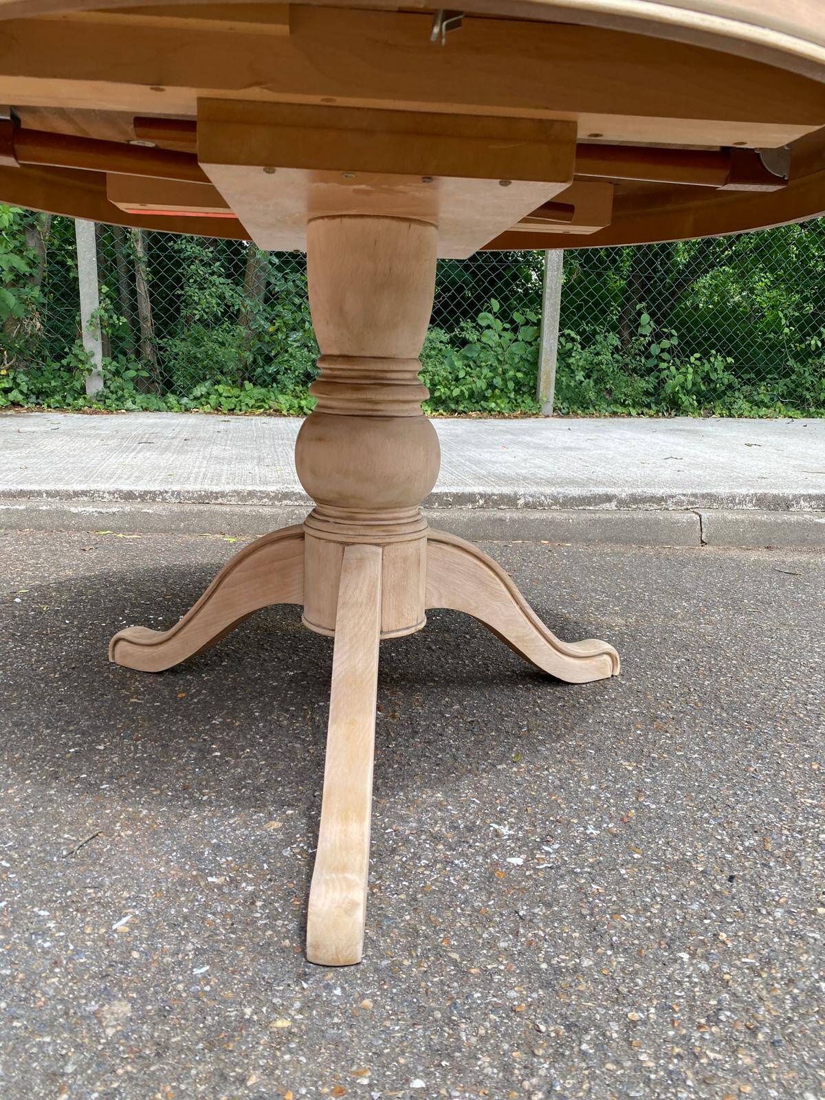 Renovated round extendable dining table with a central wooden leg, 113-203cm.