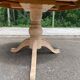 Renovated round extendable dining table with a central wooden leg, 113-203cm.