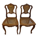 Pair of Louis XV style chairs in wood and caning.