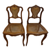 Pair of Louis XV style chairs in wood and caning.