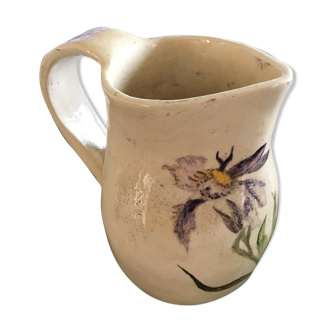 Pitcher with iris decor