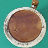 Polychrome ceramic beer mug with fat lava effect