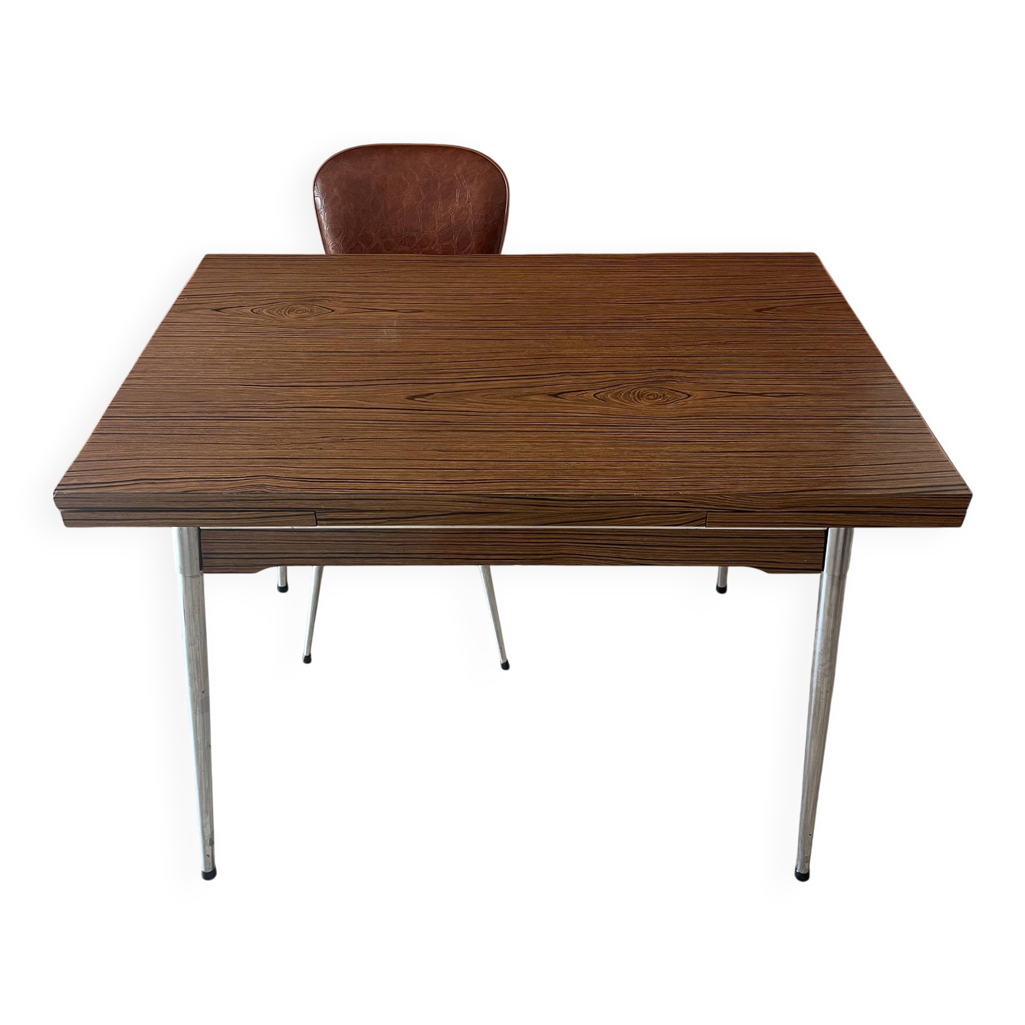 Vintage extendable kitchen table with wood effect Formica and chrome legs.