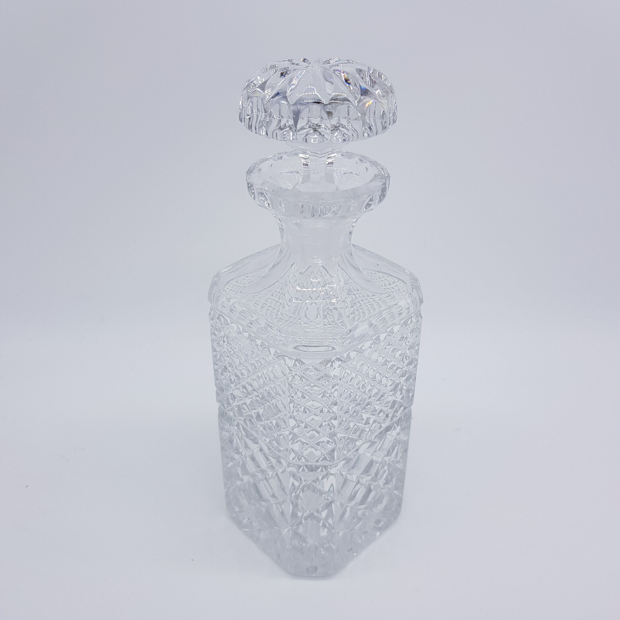 Square-shaped crystal carafe has spikes