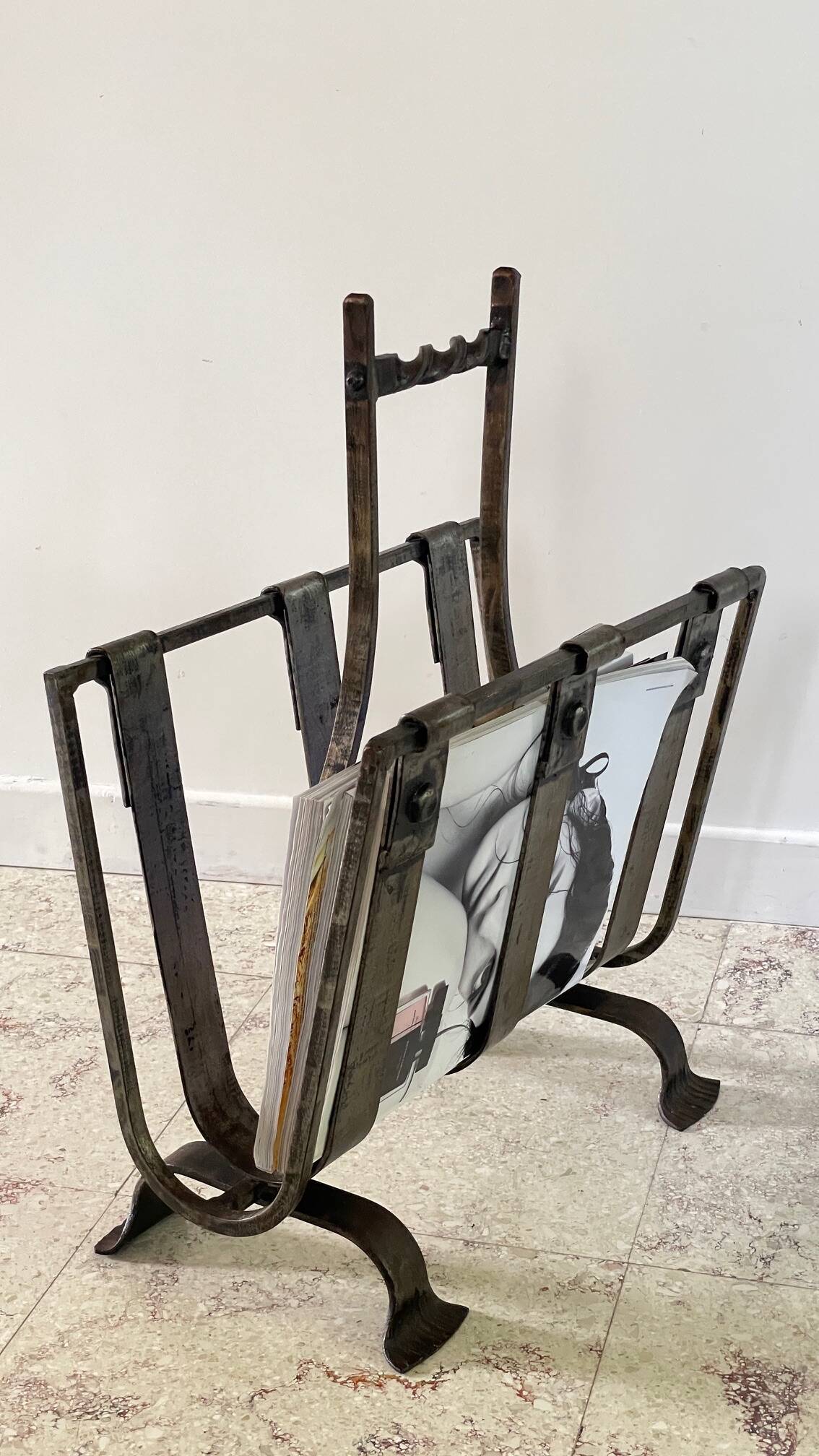 Brutalist vintage steel magazine rack