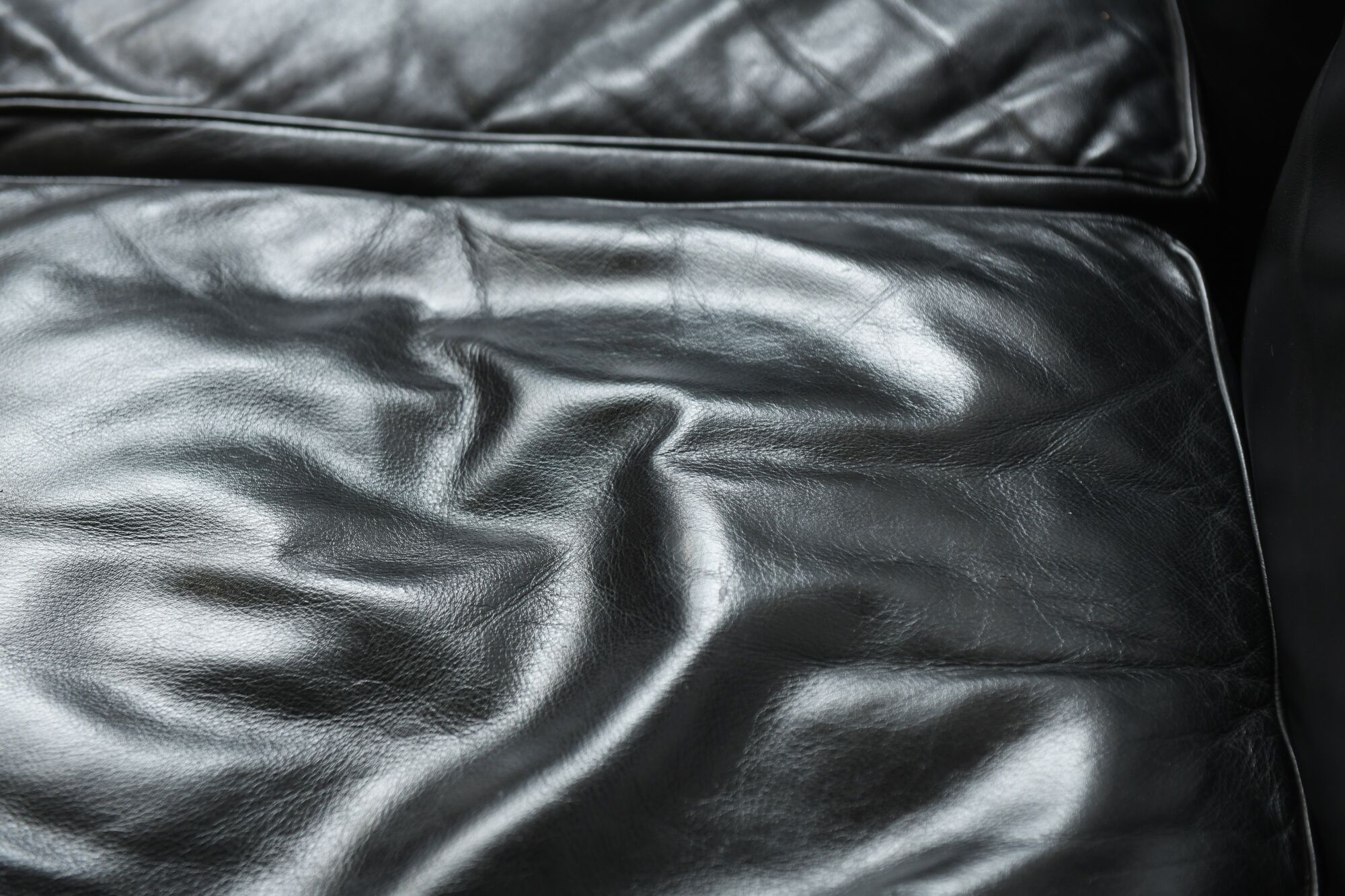 Vintage LC-2 in black leather by Le Corbusier, Jeanneret & Perriand for Cassina