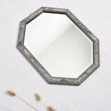Old octagonal beveled mirror.