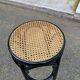 High curved black caned wooden bistro bar stool