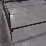 Black metal and rattan bed frame