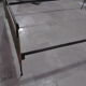 Black metal and rattan bed frame