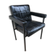Ancien fauteuil structure métal noir et skaï noir