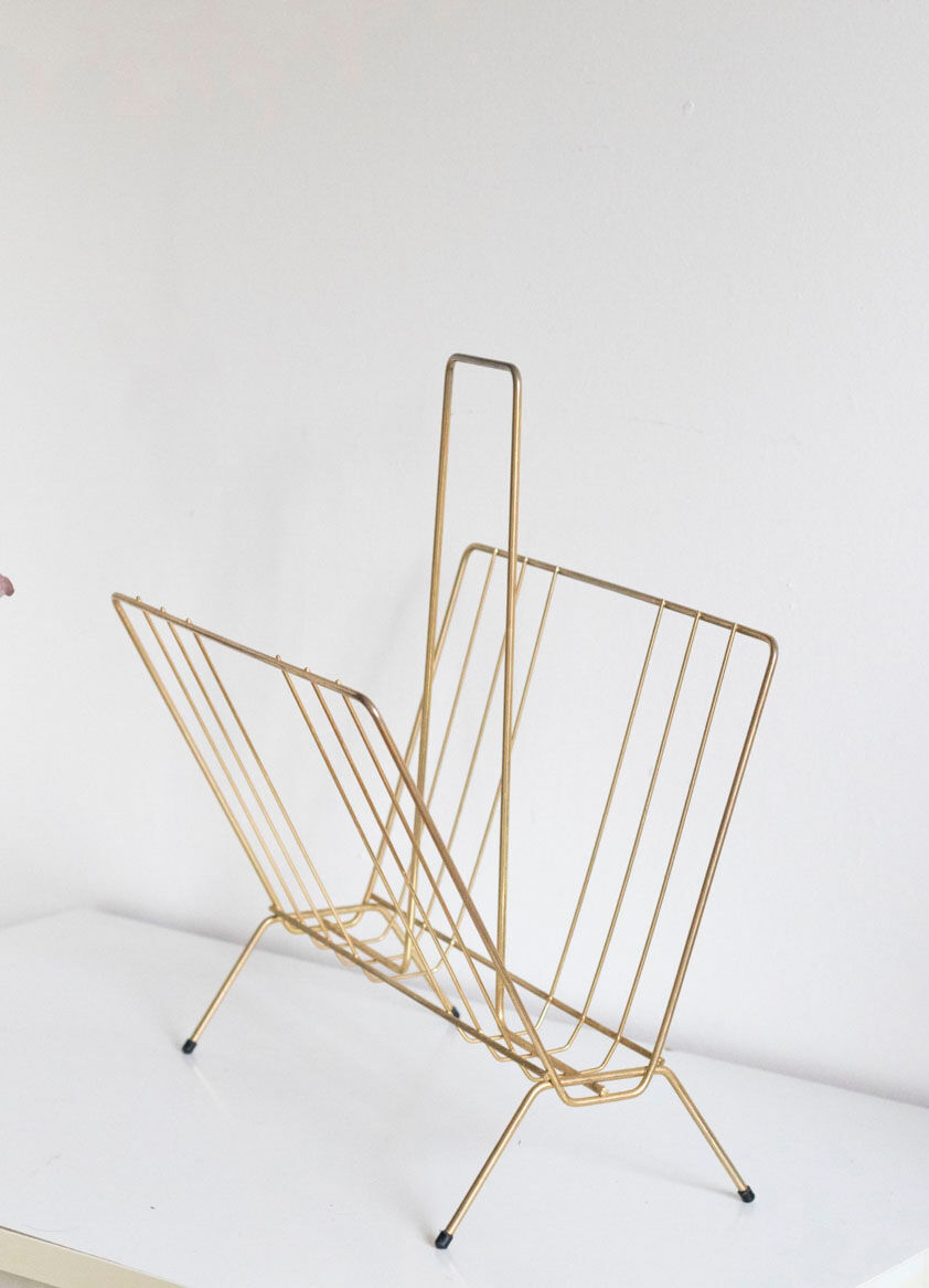 Vintage magazine holder in gold metal