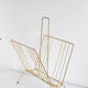 Vintage magazine holder in gold metal
