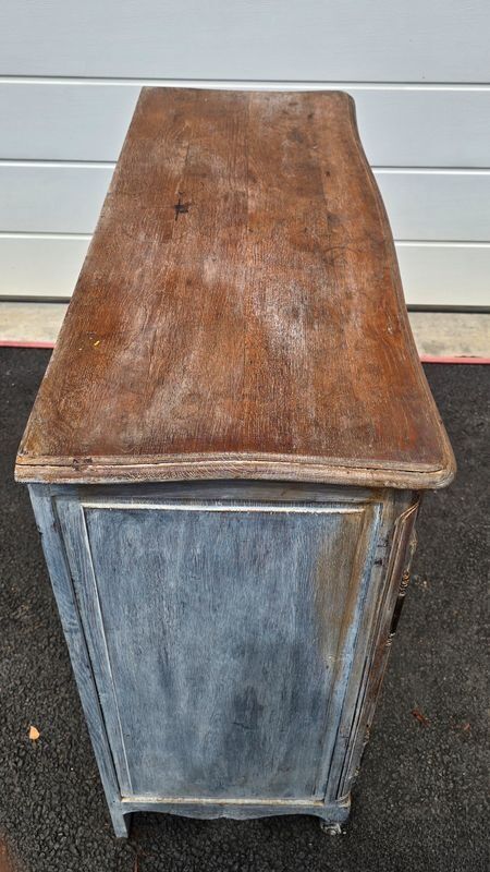Antique chest of drawers with a cerused and patinated finish.