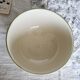 Vintage round earthenware salad bowl with fruit pattern