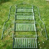 Folding green wrought iron shelf