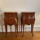 Lot of two rosewood and marble bedside tables