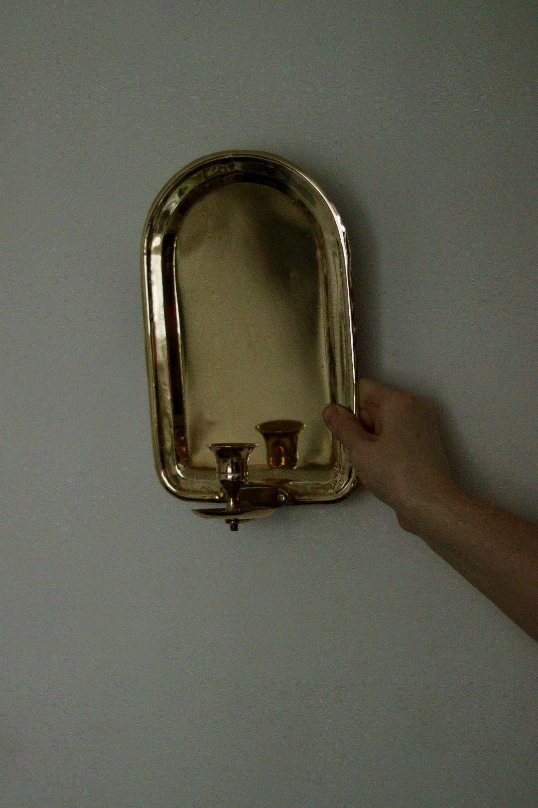 Single mid-century Swedish brass sconce