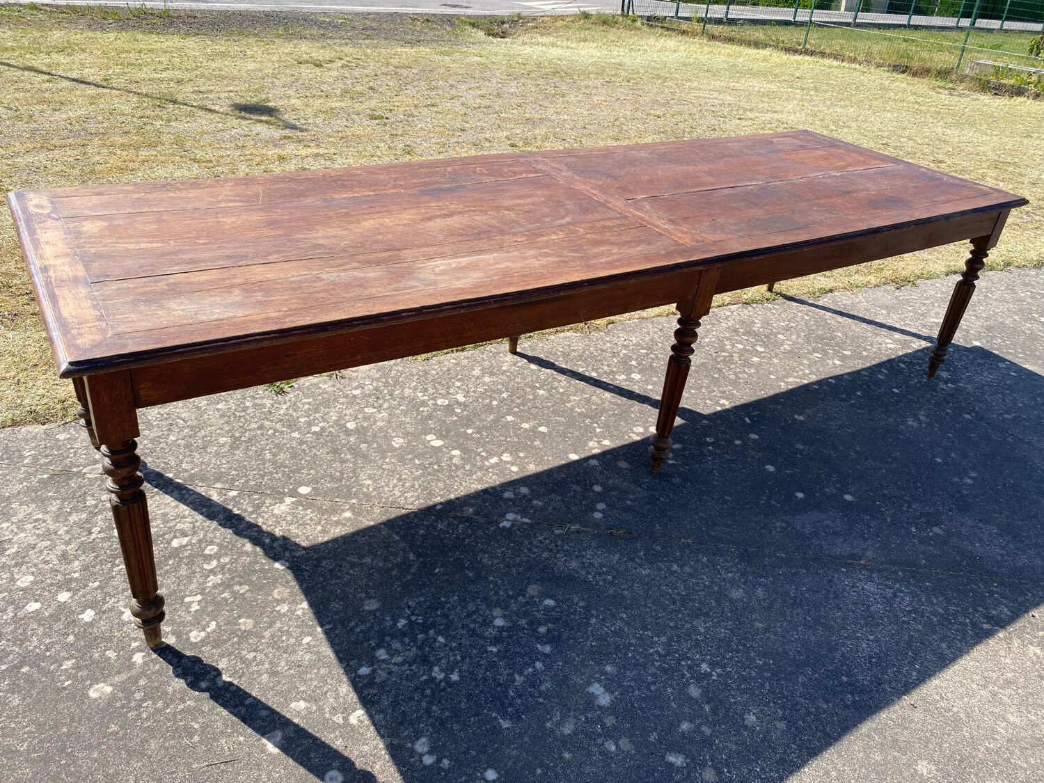 Draper table and its 10 chairs