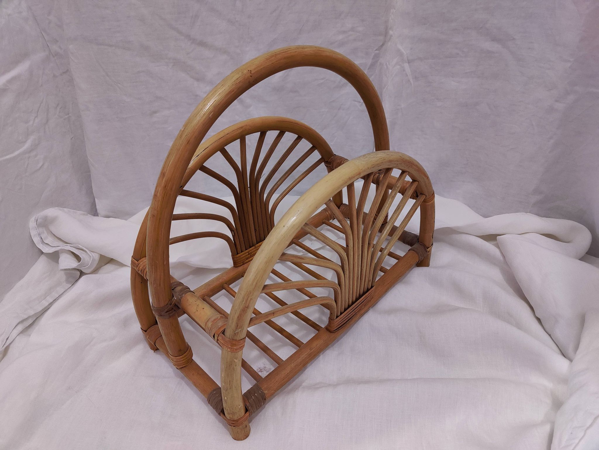 Woven bamboo magazine rack from the 1970s