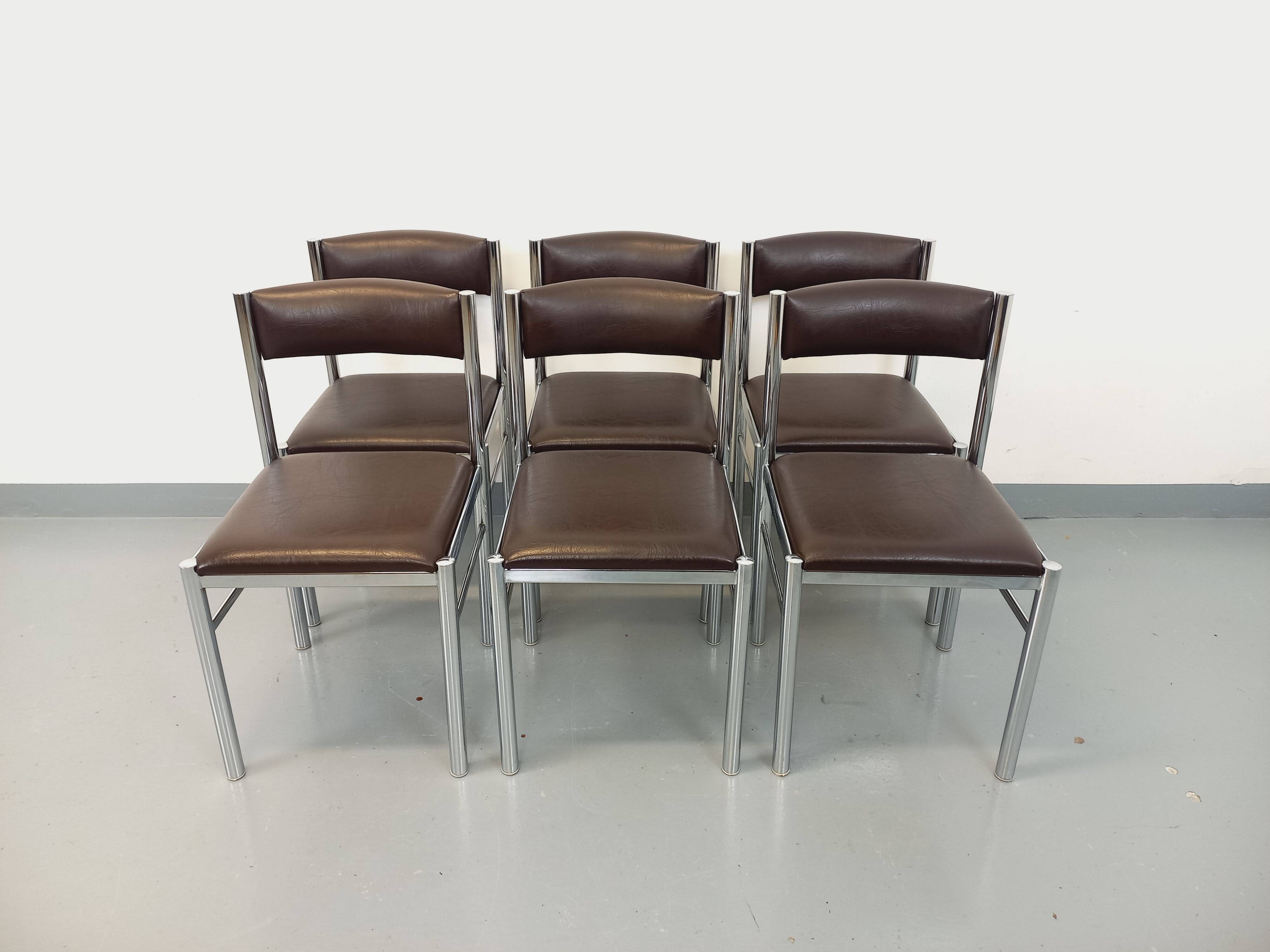 Set of 6 vintage chairs from the 70s in chrome metal and brown faux leather.
