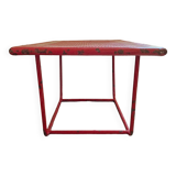 Perforated metal coffee table from the 1950s