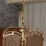 Art Deco pendant light in brass and chiseled polished glass